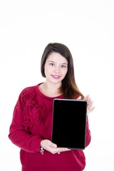 Smiling woman showing blank tablet computer screen