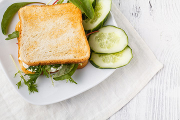 Healthy sandwiches with multi grain bread, cream cheese and greens