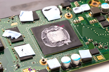 Thermal paste on the processor. Old thermal grease on the processor close-up.