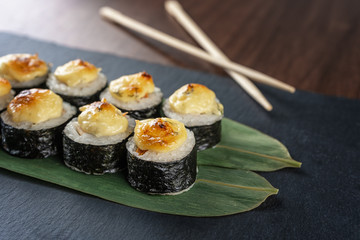 Baked rolls on bamboo stalks