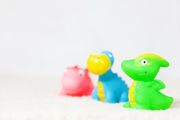 Dino toys on soft white background