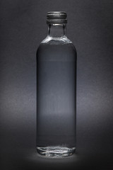 bottle of water isolated on gray background