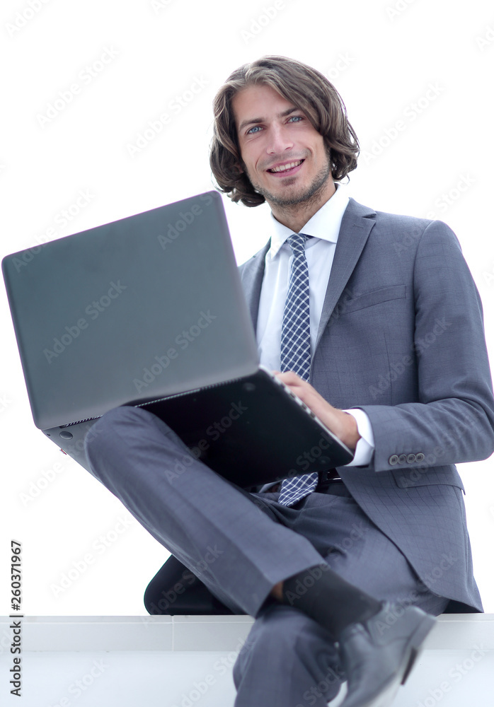 Wall mural closeup.successful businessman working on a laptop