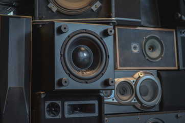 Wall of vintage loudspeakers, background. 