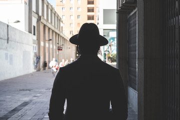 Man hat his back street