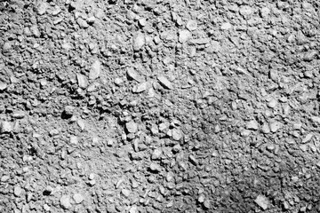 Pale blue stone texture of the wall. White paint stain on the surface. Copyspace.