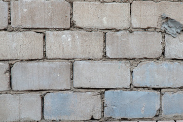 Old grey brick wall background texture