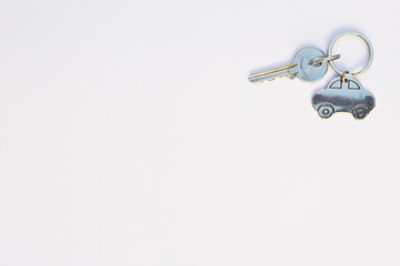 House keys and key chain isolated on white background. Copy space.