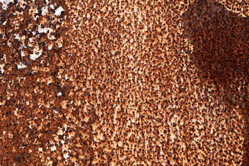 The texture of the metal. Abstract background with metal corrosion. Rusty sheet metal texture.