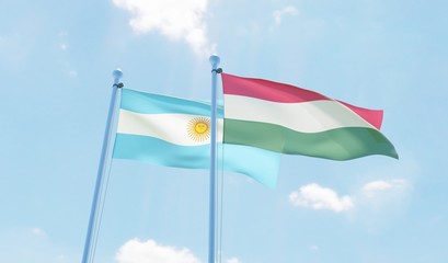 Argentina and Hungary, two flags waving against blue sky. 3d image