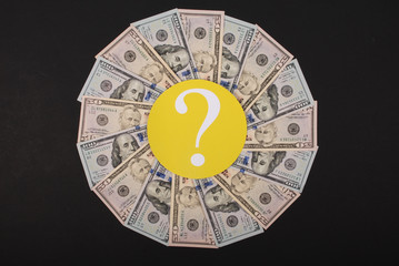 Question mark on mandala kaleidoscope from money.