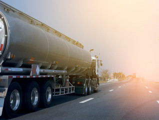 Naklejka na ściany i meble Gas or oil Truck on highway road container, transportation concept.,import,export logistic industrial Transporting Land transport on the asphalt expressway
