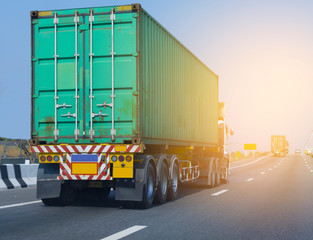 White Truck on highway road with green  container, transportation concept.,import,export logistic industrial Transporting Land transport on the asphalt expressway
