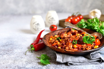 Chili con carne - minced meat stew with red bean and tomato.Traditional dish of mexican cuisine.