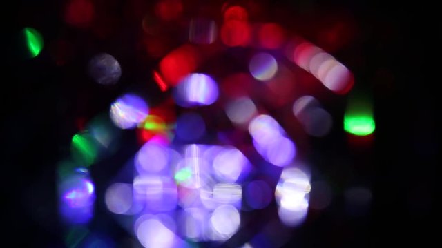 Multicolored flickering dots in full blur