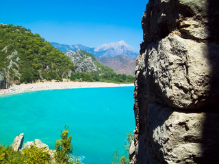  View from the rock to the sea and the beach and mountains. Turkey, Cirali village.