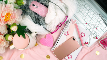 Flat lay working or studing from the cozy comfort of bed.