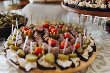 Snack on a buffet table. Festive snacks.