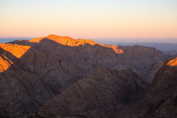 Naklejka na ściany i meble Egypt. Mount Sinai in the morning at sunrise. (Mount Horeb, Gabal Musa, Moses Mount). Pilgrimage place and famous touristic destination.