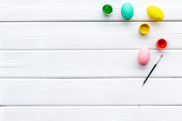 Traditional Easter eggs for paint on white wooden background top view space for text