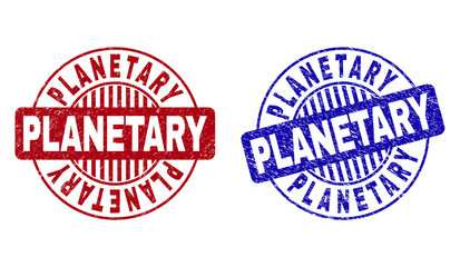 Grunge PLANETARY round stamp seals isolated on a white background. Round seals with grunge texture in red and blue colors. Vector rubber overlay of PLANETARY text inside circle form with stripes.