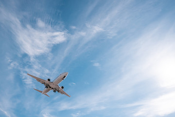Fototapeta na wymiar Plane in the sky. Aviation, travel air transportation concept