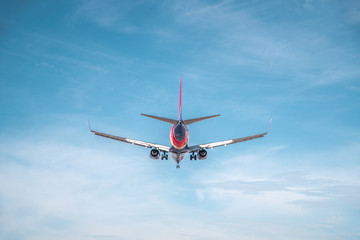 Aviation, travel, air transportation concept. Airplane in blue sky
