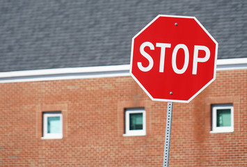close up on stop sign in the urban area