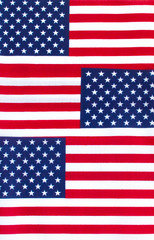 Naklejka premium Background wallpaper-3 small American flags overlapping each other in a vertical row
