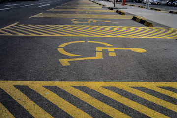 Disabled person sign on the parking lot reserved