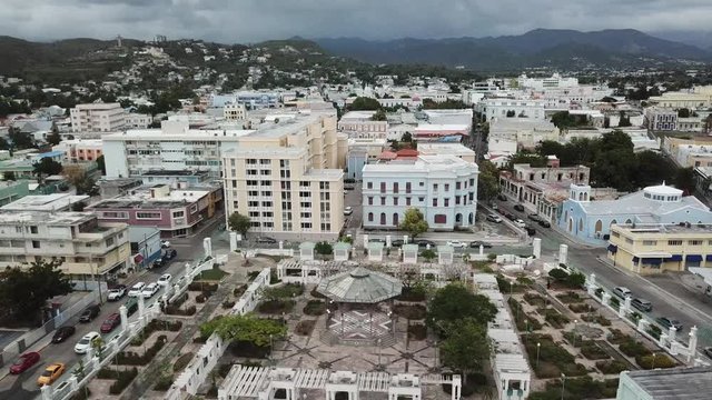 AERIAL: slow and wide rotating around the Parque Urbano Dora Colon which is in the center of Ponce, Puerto Rico.