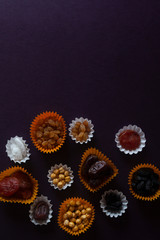 Eid Mubarak. Different iftar sweets. Celebrating Eid Al Adha. Islamic traditional holiday. Eid al-Fitr. Holly month Ramadan. Middle Eastern religious holiday. Dried date fruit. Flat lay, top view.