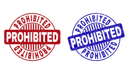Grunge PROHIBITED round stamp seals isolated on a white background. Round seals with grunge texture in red and blue colors. Vector rubber overlay of PROHIBITED caption inside circle form with stripes.