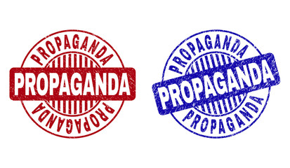Grunge PROPAGANDA round stamp seals isolated on a white background. Round seals with grunge texture in red and blue colors. Vector rubber imprint of PROPAGANDA caption inside circle form with stripes.