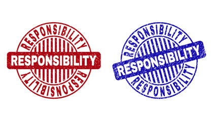 Grunge RESPONSIBILITY round stamp seals isolated on a white background. Round seals with grunge texture in red and blue colors.