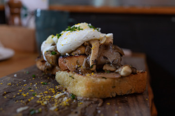 Mushroom sandwich with an egg on top