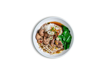 Bowl of asian noodles with vegetables and pork