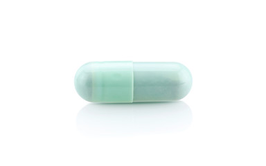 blue medicine capsule isolated on white background