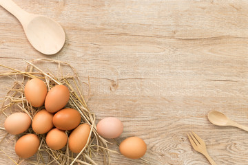 Eggs for cooking on wood background top view.Flat lay.