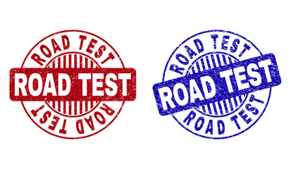 Grunge ROAD TEST round stamp seals isolated on a white background. Round seals with grunge texture in red and blue colors. Vector rubber imitation of ROAD TEST caption inside circle form with stripes.