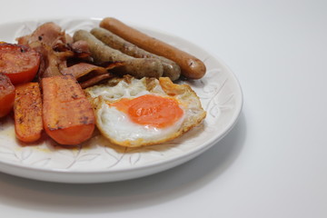 Continental Breakfast, Sausage, Bacon,Egg, Tomatoes and Carrot