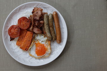 Continental Breakfast, Sausage, Bacon,Egg, Tomatoes and Carrot