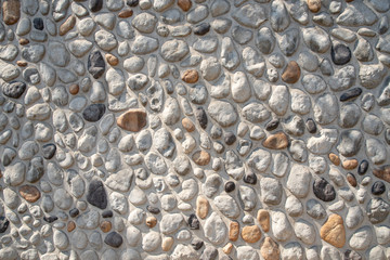 Wall made of gravel and cement. Backgrounds, Textures