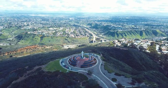 Beautiful Drone View of Mt. Soledad Cross in La Jolla, California. Smooth, 4K HD Aerial. Mount Soledad Veterans Memorial near Mission Bay, Mission Beach, North PB.