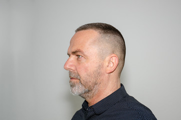 Obraz premium Profile portrait of a man with short haircut
