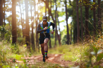 A man Runner of Trail . and athlete's feet wearing sports shoes for trail running in the forest