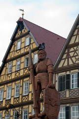 Bad Mergentheim Germany, 1926 statue of Teutonic knight in front of traditional half-timbered houses