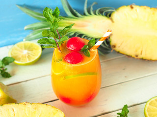 Naklejka na ściany i meble Iced pineapple juice topping with watermelon and mint for summer drinks concept.