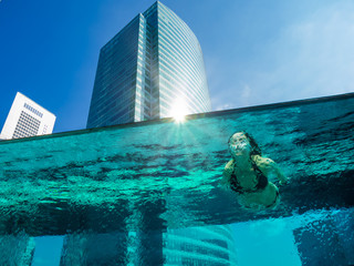 swimming underwater at the luxury hotel in Singapore
