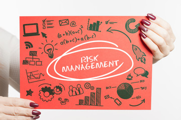 Business, Technology, Internet and network concept. Young businessman shows the word: Risk management
